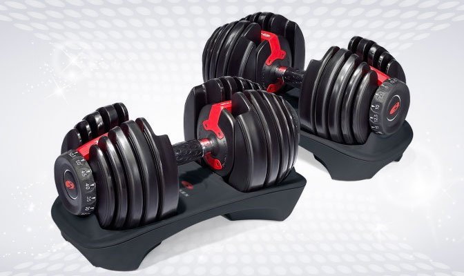 2 red and black dumbbells with 15 different weights